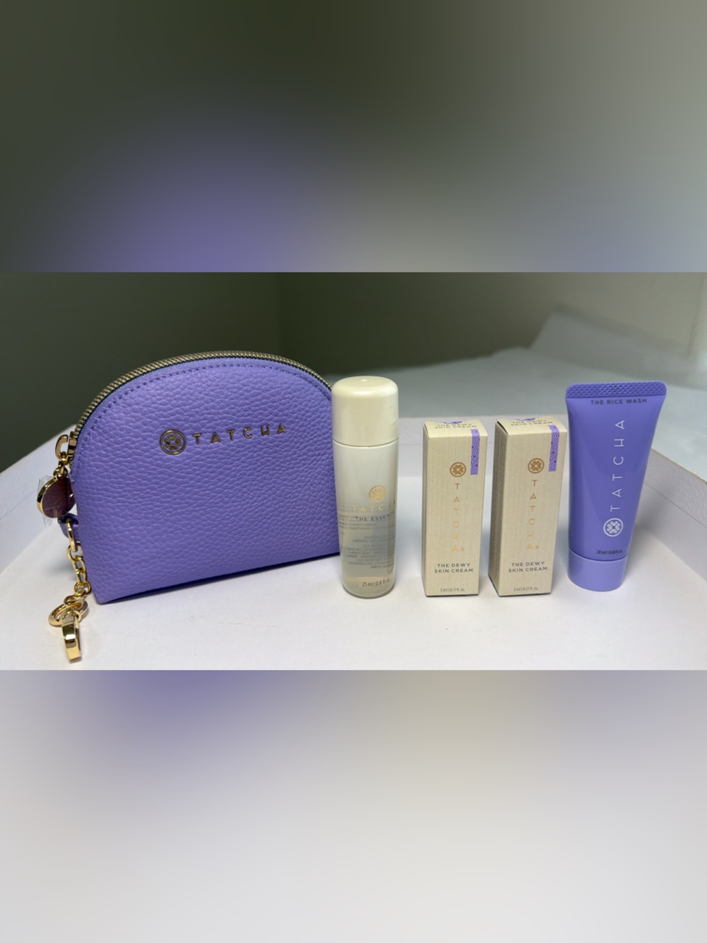 New,unused Tatcha Purple Pebbled Zip Cosmetic key ring Pouch with mini Skincare